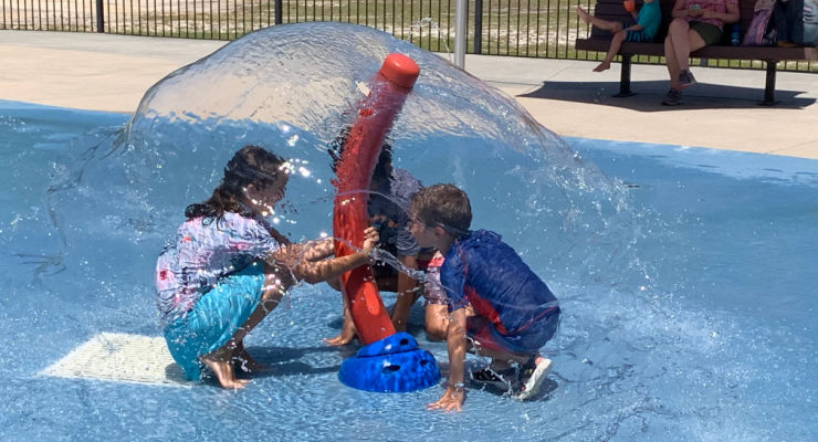 Kids playing at a splashpad in Columbia, SC