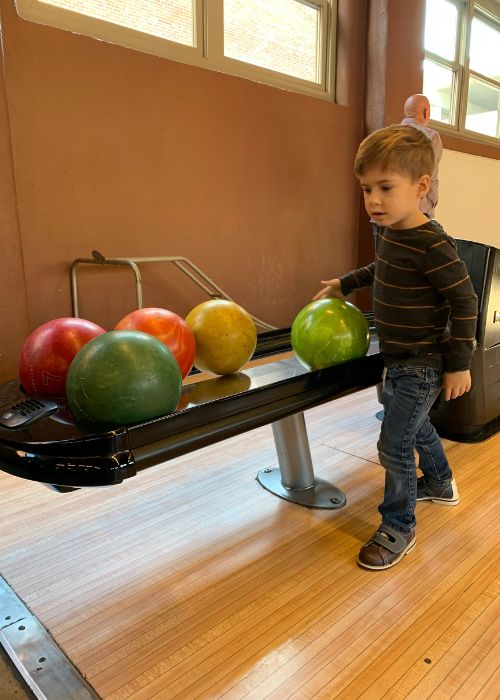 Child bowling at The Grand in Columbia, SC