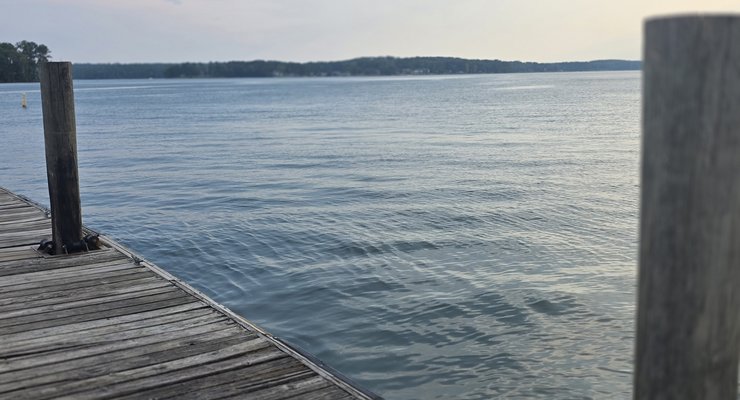 Close-up view of Lake Murray water from the wooden dock at Dreher Island State Park SC