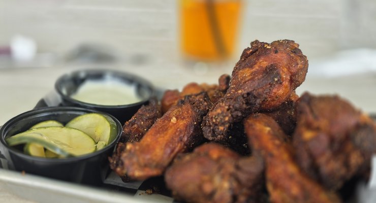 Crispy chicken wings at 518 Smokehouse part of the dollar wings Monday special in Chapin SC