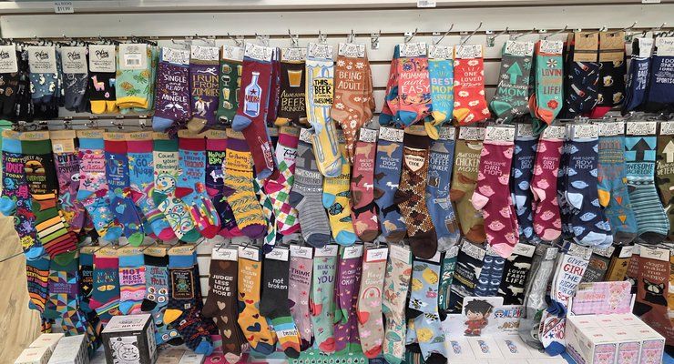 Wall of colorful novelty socks at Linga Binga in Chapin, SC